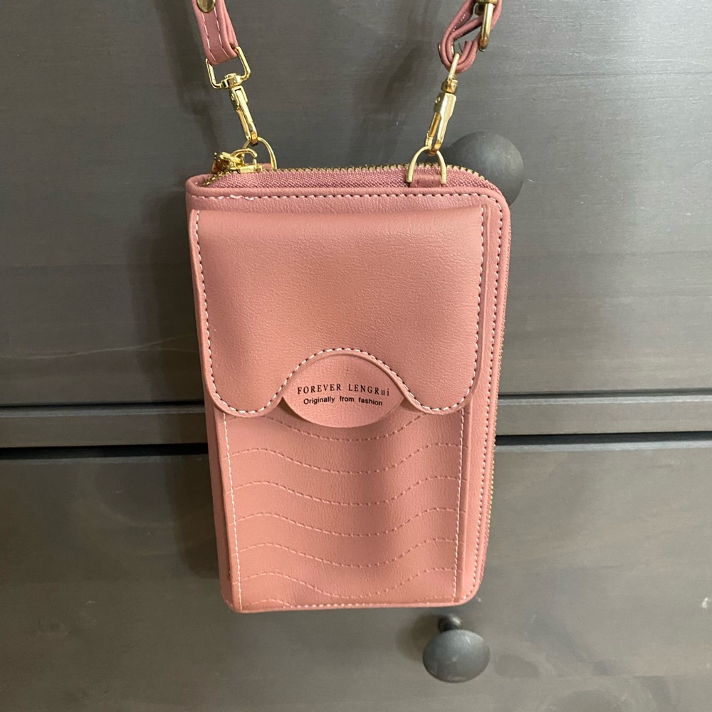 Soft Pink Leather Crossbody Bag with Gold Accents